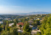 Καιρός στην Αττική σήμερα: Έως 38°C και βοριάς στα βόρεια προάστια Ηλιόλουστη πανοραμική εικόνα των καταπράσινων βορείων προαστίων με τα δέντρα να κινούνται από τον βοριά