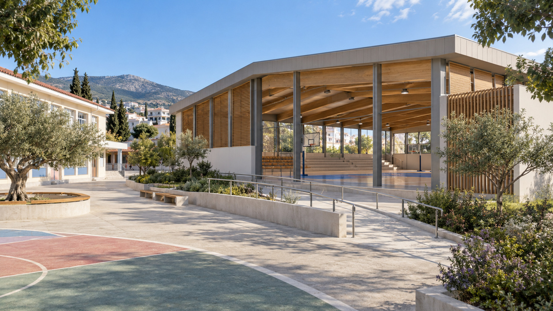 Σύγχρονη προσβάσιμη κλειστή αίθουσα αθλητισμού και εκδηλώσεων δίπλα σε σχολική αυλή